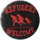 Zur Artikelseite von "Refugees welcome (rot)", 50mm Button für 1,40 €