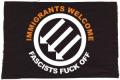 Zum Aufnäher "Immigrants Welcome" für 1,10 € gehen.