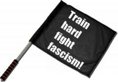 Zum/zur  Fahne / Flagge (ca. 40x35cm) "Train hard fight fascism !" für 15,00 € gehen.