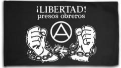 Zur Fahne / Flagge (ca. 150x100cm) "Libertad presos obreros!" für 25,00 € gehen.